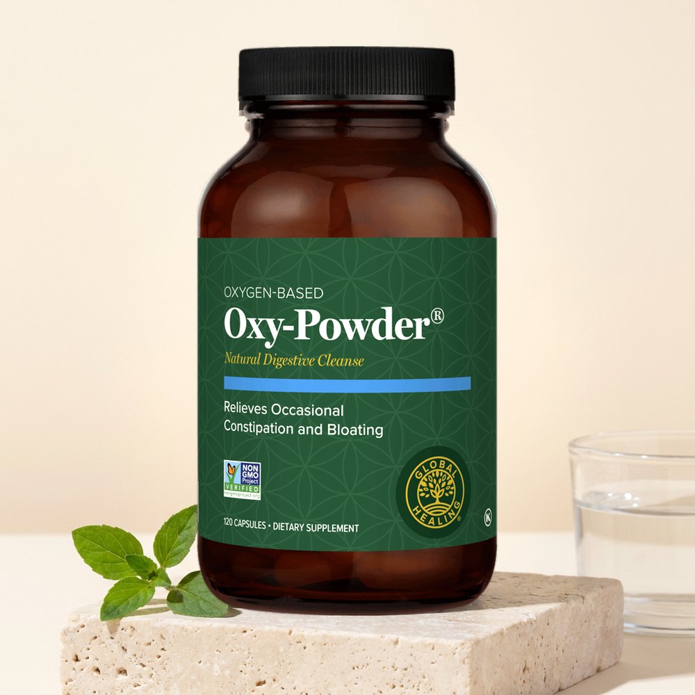 Global Healing Oxy-Powder bottle on a stone block